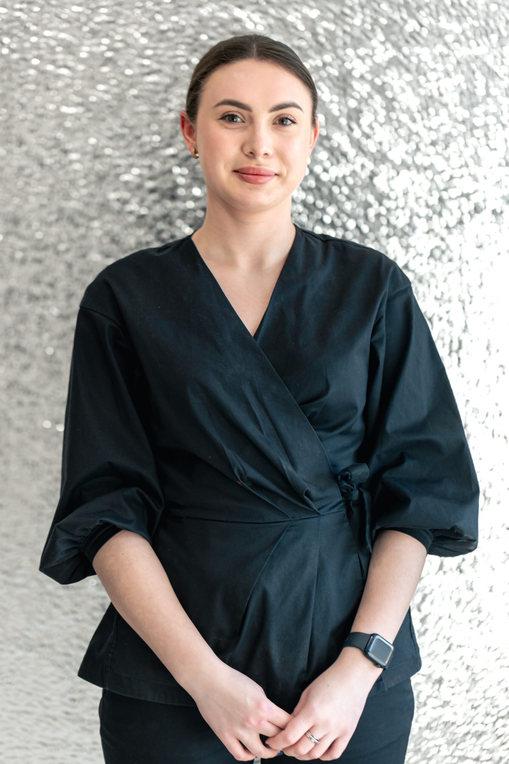 Portrait of a young female dentist. Dentistry concept. Dental treatment. High quality photo. Close-up portrait of a dentist.